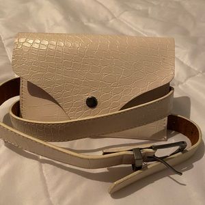 Small off-white around the waist purse
